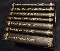 The New Webster’s Library of Practical Information desktop set of 7. Aged.